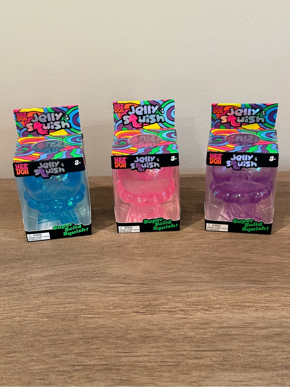 NeeDoh Jelly Squish Kids Squishy Toy - Blue, Pink, Purple (3 pack)